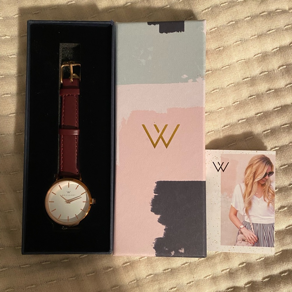 Brand new Wristology wrist watch with gold detailing and maroon leather band!